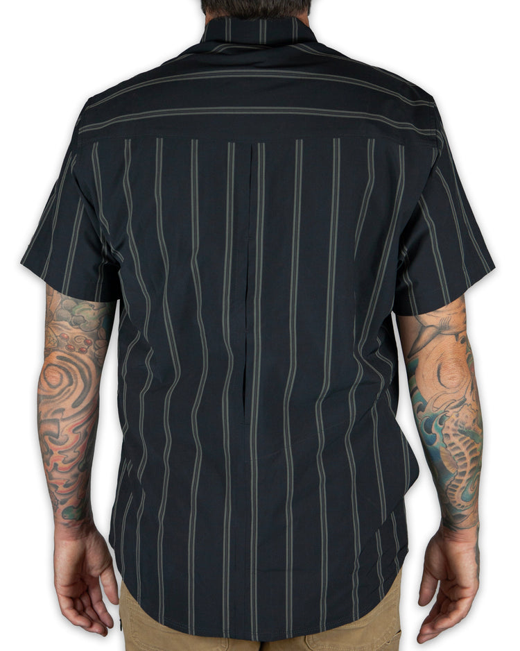 Vintage black Daryll SS shirt by Off The Grid Surplus, a classic button-up shirt with a casual, rugged style.