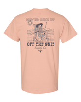 Dusty rose Never Give Up T-shirt by Off The Grid Surplus, featuring bold text and casual fit for everyday wear.