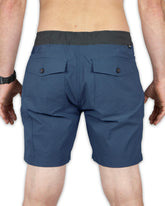 Grey blue Thunderbird Short by Off The Grid Surplus, displayed flat, showcasing comfortable fit and stylish casual design.