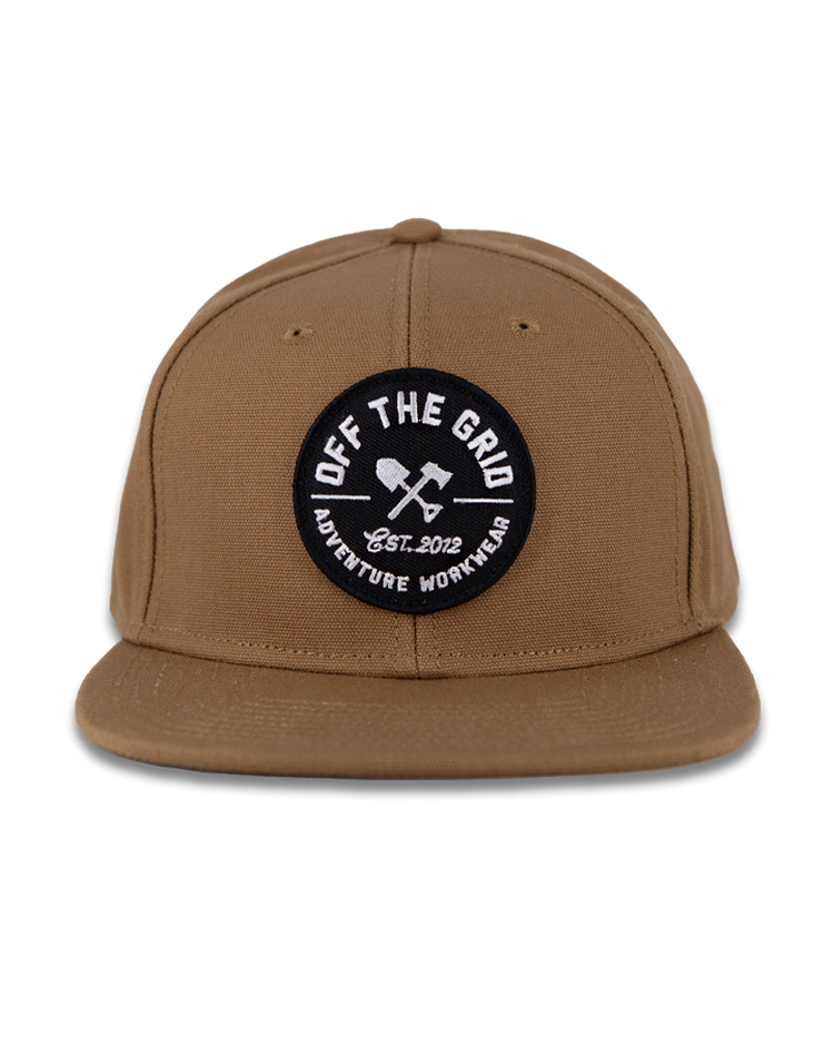 Black Off The Grid Surplus Jobsite Hat showing a sturdy cap with adjustable strap and logo patch on the front.