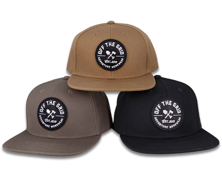 Black Off The Grid Surplus Jobsite Hat with adjustable strap and logo patch, designed for durable workwear.