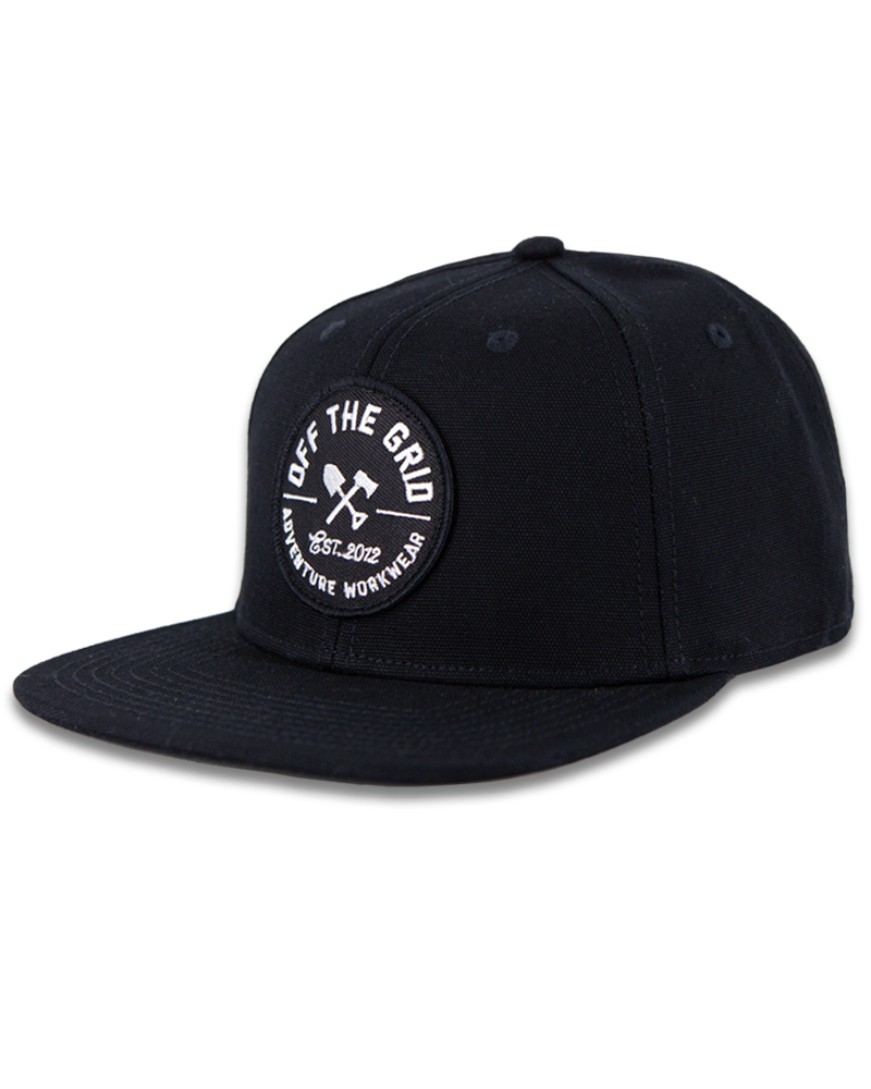 Black Off The Grid Surplus jobsite hat with adjustable strap and logo patch, designed for durability and outdoor work.