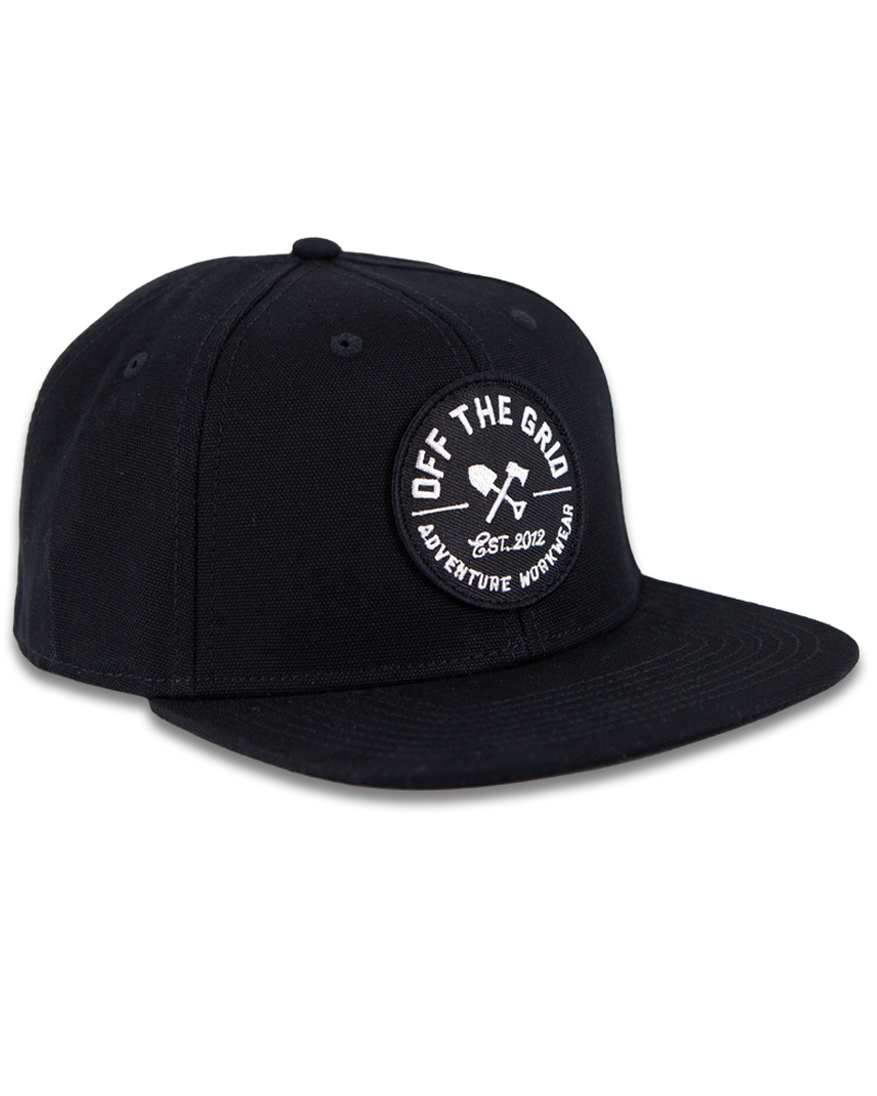 Black Off The Grid Surplus Jobsite Hat featuring a curved brim and adjustable strap for a secure fit.