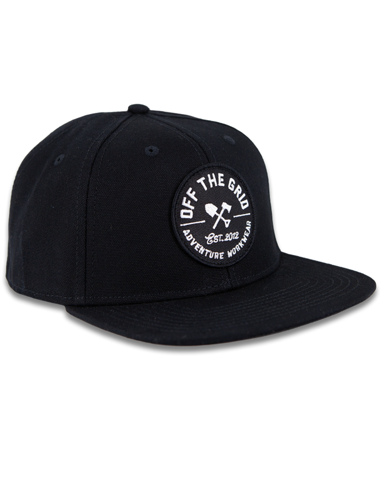 Black Off The Grid Surplus Jobsite Hat featuring a curved brim and adjustable strap for a secure fit.