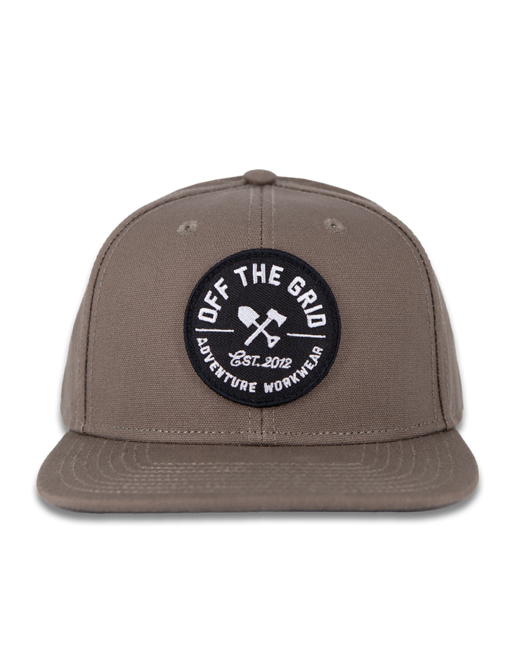 Black Off The Grid Surplus jobsite hat with adjustable strap and durable fabric, designed for work environments.