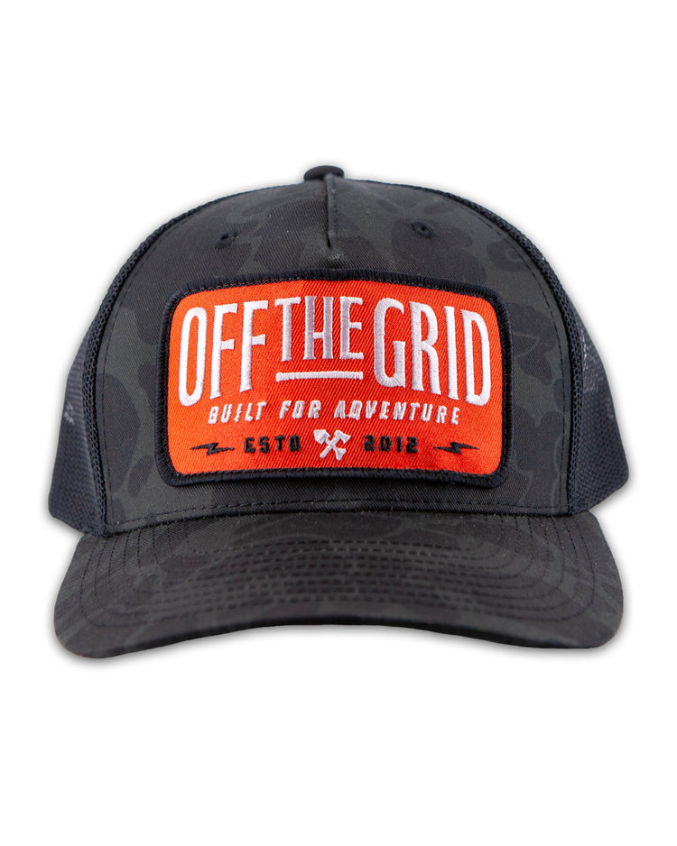 Off The Grid Surplus Ranch Hand hat in sable duck camouflage with black accents, featuring a wide brim and rugged design.