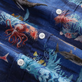 Blue Hawaiian shirt for men by Outlets Yiume featuring ocean marine life and short sleeves, perfect for a relaxed tropical look.