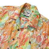 Orange Hawaiian fish print men’s short sleeve cotton shirt with camp collar by Outlets Yiume, oceanic design for a casual look.
