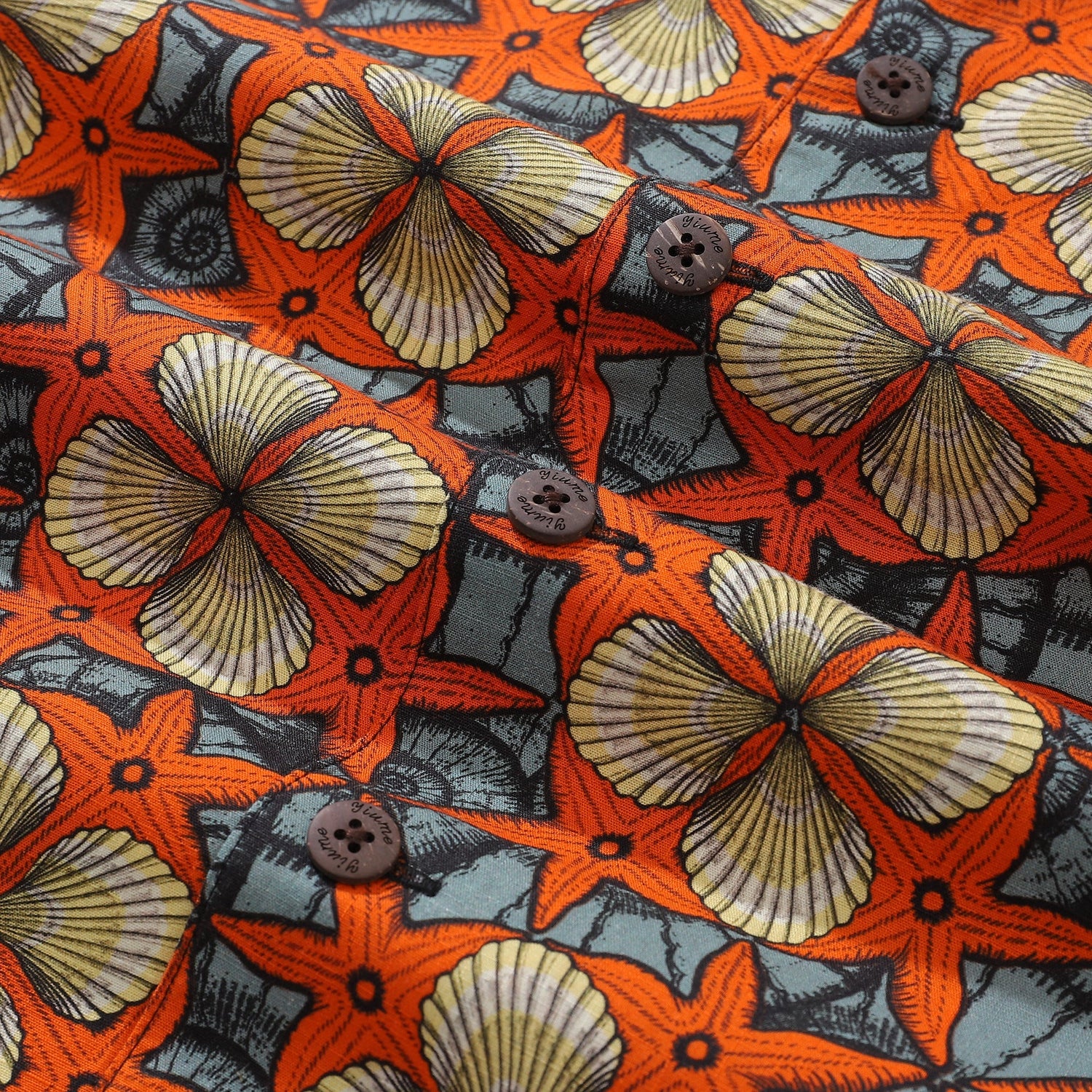 Vintage 1940s Hawaiian shirt for men by Outlets Yiume, short sleeve, 100% cotton with starfish and shells print.
