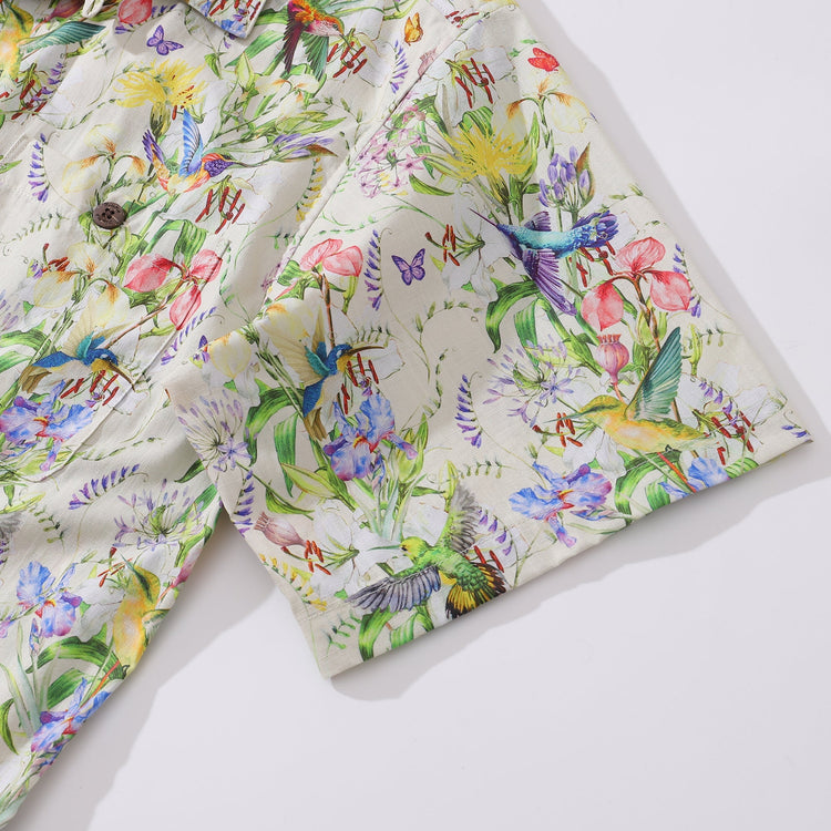 Men’s Hawaiian shirt by Outlets Yiume featuring hummingbirds dancing among flowers, short sleeve, camp collar, 100% cotton.