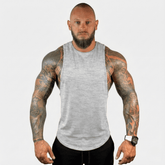 Black Physique Bodyware Drop Arm Tank Top with wide armholes, perfect for workout and casual wear.