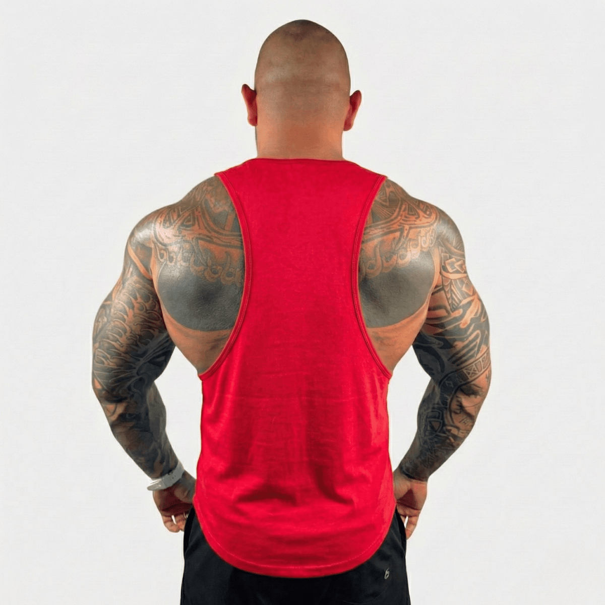 Black Physique Bodyware Drop Arm Tank Top featuring a sleeveless design and relaxed fit, ideal for workouts and casual wear.