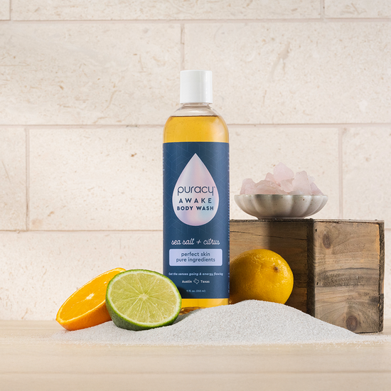 Puracy acidified PH-balanced citrus and sea salt body wash in a clear bottle with a pump dispenser.