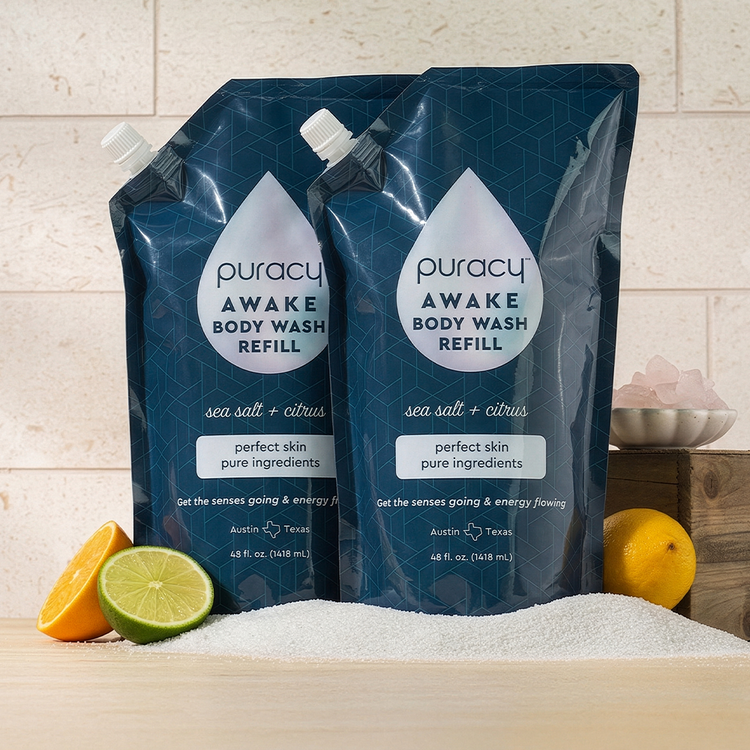 Puracy acidified, pH balanced citrus and sea salt body wash in a clear bottle with a pump dispenser.