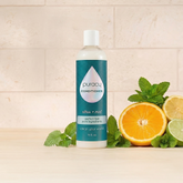 Puracy citrus mint conditioner in a bottle, sulfate and silicone-free hair conditioner with natural ingredients.