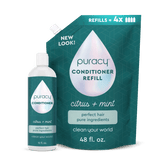 Puracy conditioner with citrus mint scent, sulfate-free and silicone-free, showing the bottle with label and citrus fruits.