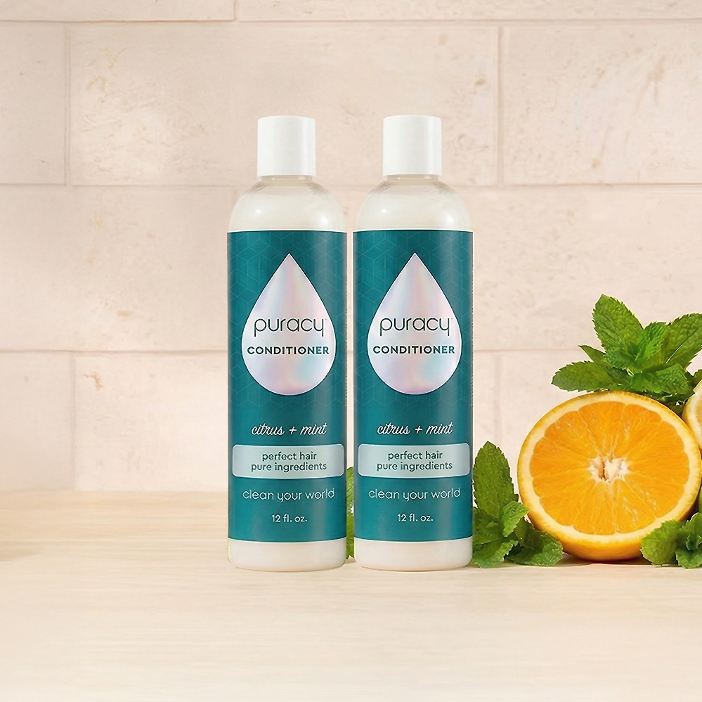 Puracy conditioner with citrus and mint scent, sulfate-free silicone and dimethicone free for healthy hair care.