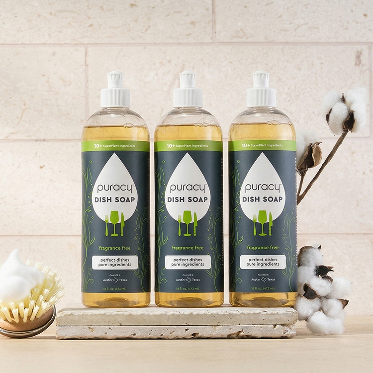 Puracy dish soap with green tea and lime scent, three-pack of natural dish cleaning liquid in clear bottles.