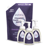 Three bottles of Puracy lavender vanilla foaming hand soap with pump dispensers, showcasing the product packaging and branding.