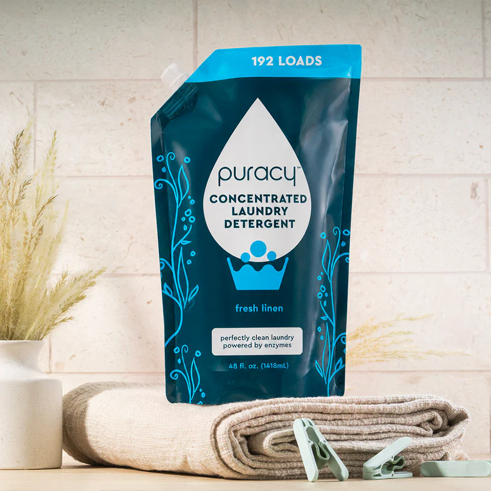 Puracy concentrated laundry detergent in a white bottle, sulfate-free and unscented, suitable for all laundry types.