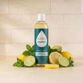 Puracy sulfate, paraben, silicone-free citrus mint shampoo bottle with label and pump for natural hair cleansing.