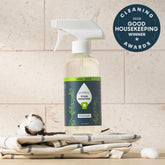 Puracy unscented laundry stain remover in a travel-sized bottle, designed to eliminate tough stains from clothes effectively.