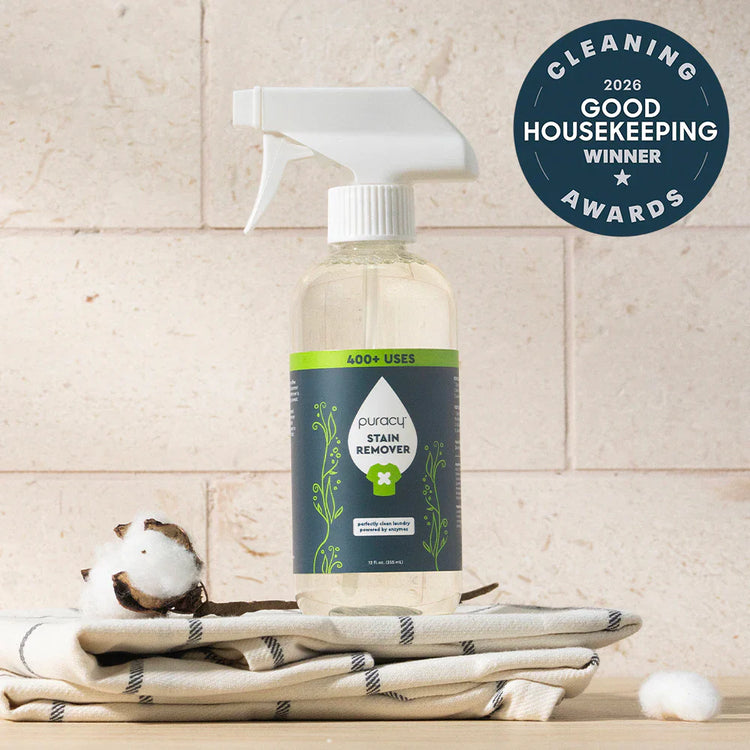 Puracy unscented laundry stain remover in a travel-sized bottle, designed to eliminate tough stains from clothes effectively.