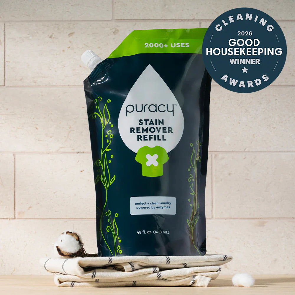 Puracy unscented laundry stain remover bottle, showing product label and applicator tip, designed for removing tough stains from clothes.