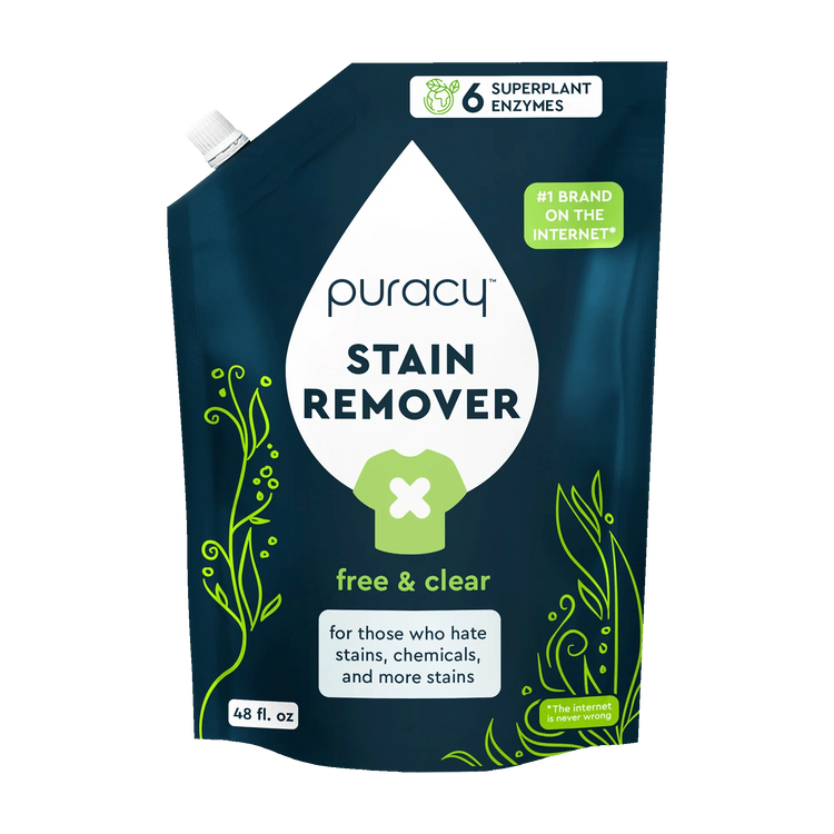 Puracy unscented laundry stain remover bottle showing label and applicator tip for effective stain removal.
