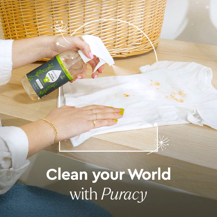 Puracy unscented laundry stain remover in a travel-size bottle, designed to treat tough stains on clothing and fabrics.