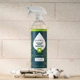 Puracy Unscented Instant Spot Remover bottle with applicator tip for quick stain removal on fabric and clothing.
