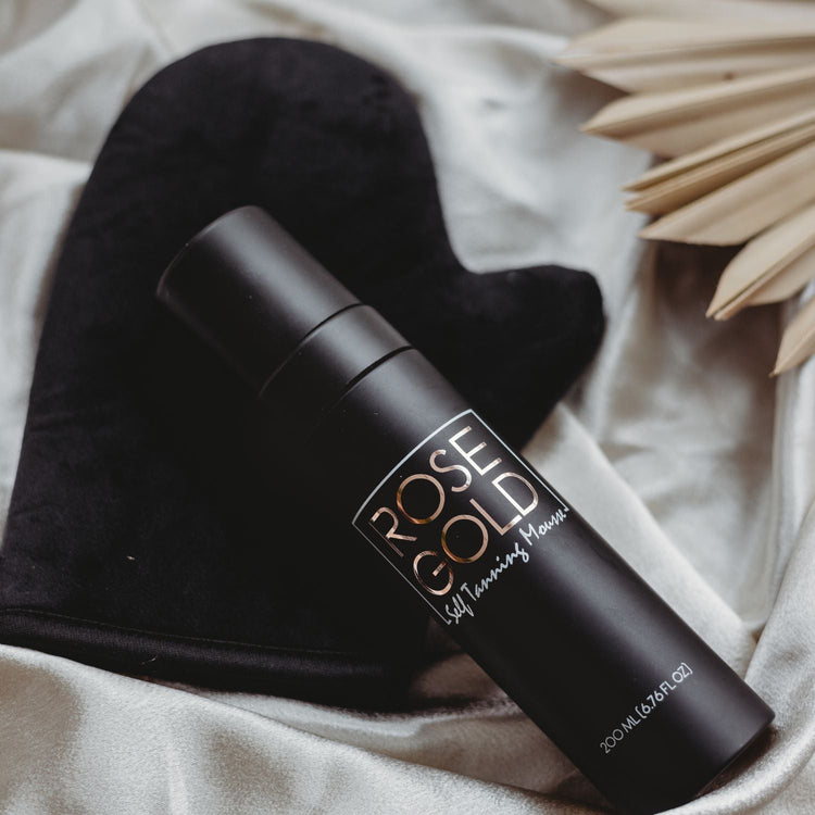 Rose Gold Sunless Self Tanning Starter Kit bundle with tanning mousse, mitt, and guide for a natural glow.