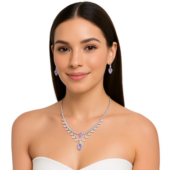 Lavender crystal jewelry set with necklace and earrings featuring Aurora design, crafted by Farmacias Savia.