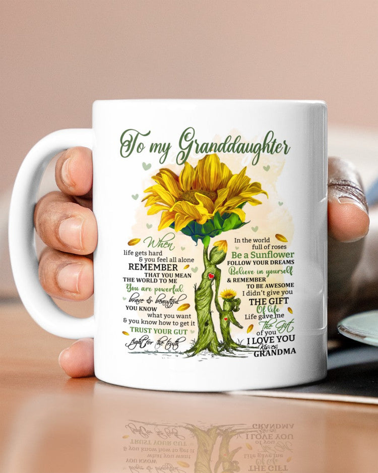 11oz ceramic mug from TEELUVS.COM featuring a heartfelt design for a granddaughter, perfect as a gift from grandma.