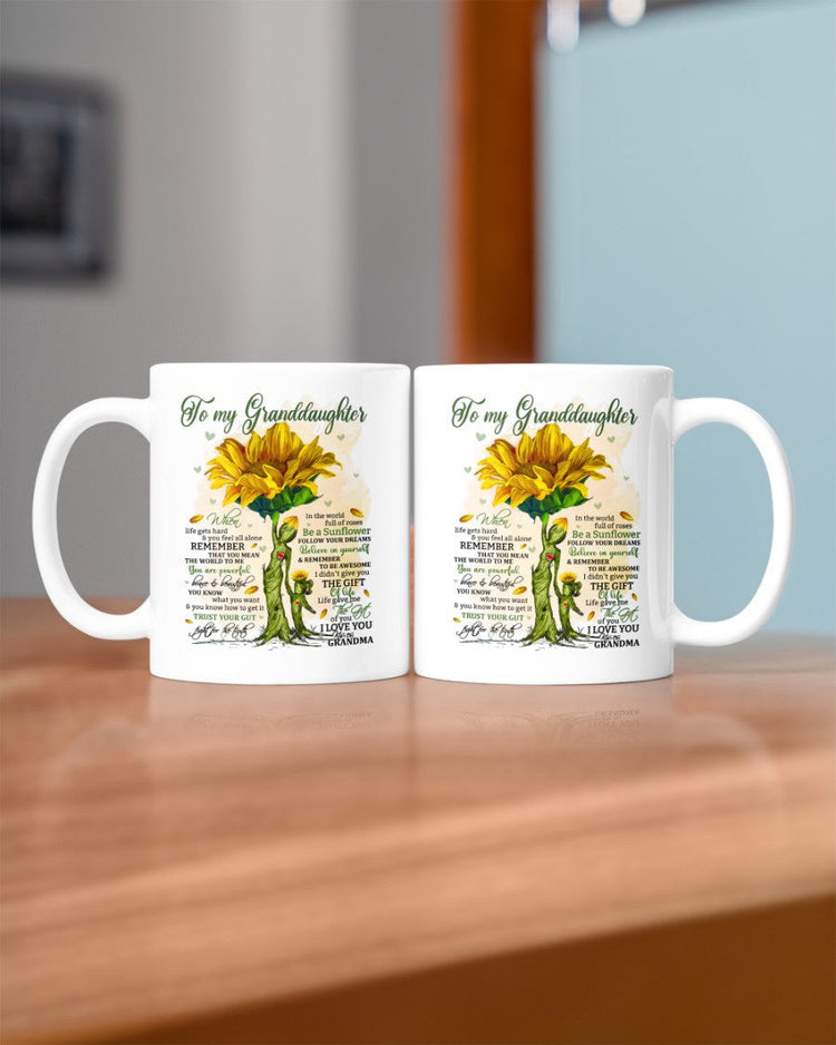 11oz ceramic mug from TEELUVS.COM featuring "To Granddaughter" message, perfect gift from grandma with colorful design.