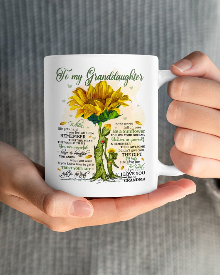 11oz ceramic mug with "To Granddaughter" message, gift from grandma, featuring colorful floral design, by TEELUVS.COM