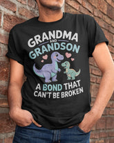 Black unisex dinosaur T-shirt from TEELUVS.COM featuring a grandma and grandson bond graphic, perfect for kids and family bonding.