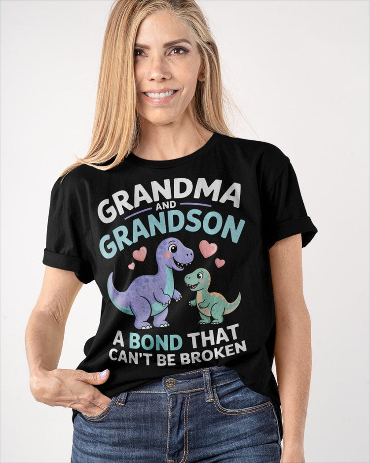 Black unisex dinosaur T-shirt by TEELUVS featuring a grandma and grandson bond design, perfect for kids and family matching.
