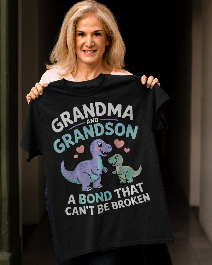 Black unisex T-shirt featuring a grandma and grandson dinosaur design from TEELUVS.COM, symbolizing a bond that can&
