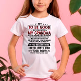 White kid’s T-shirt with "I TRY TO BE GOOD BUT I TAKE AFTER MY GRANDMA" text, from TEELUVS.COM for granddaughter.