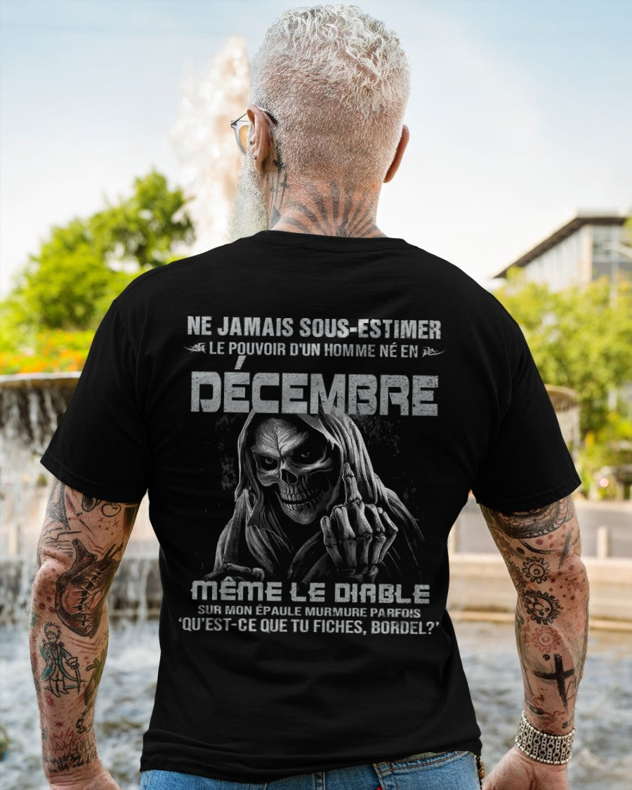 Black T-shirt for men born in December with "Never Underestimate the Power of a December Man" text, by TEELUVS.COM.