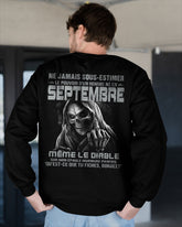 Black T-shirt for men born in September with "Never Underestimate the Power of a Man Born in September" text, by TEELUVS.COM.