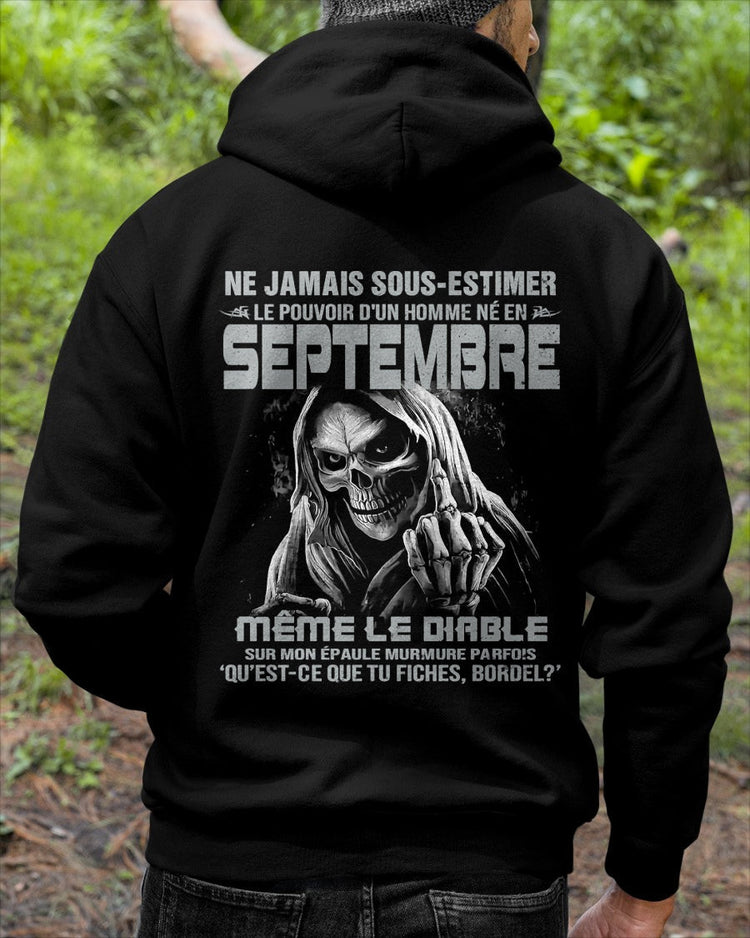 Black T-shirt for men born in September with "Never Underestimate the Power of a September Born Man" text, by TEELUVS.COM.