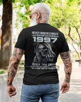 Black TEELUVS.COM T-shirt featuring "Never Underestimate Us 1997" printed design, front view, size S.