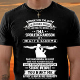 Black T-shirt from TEELUVS.COM featuring the "Spoiled by Grandma" June Edition design for grandsons.