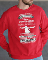 Black "Spoiled by Grandma" June Edition T-shirt for grandson, featuring playful text from TEELUVS.COM.