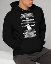 Black "Spoiled by Grandma" June Edition T-shirt for grandson, featuring playful text from TEELUVS.COM.