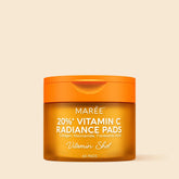 Maree Dark Spot Fading Vitamin C Pads displayed on a card, showing textured toner pads for brightening and skin tone improvement.