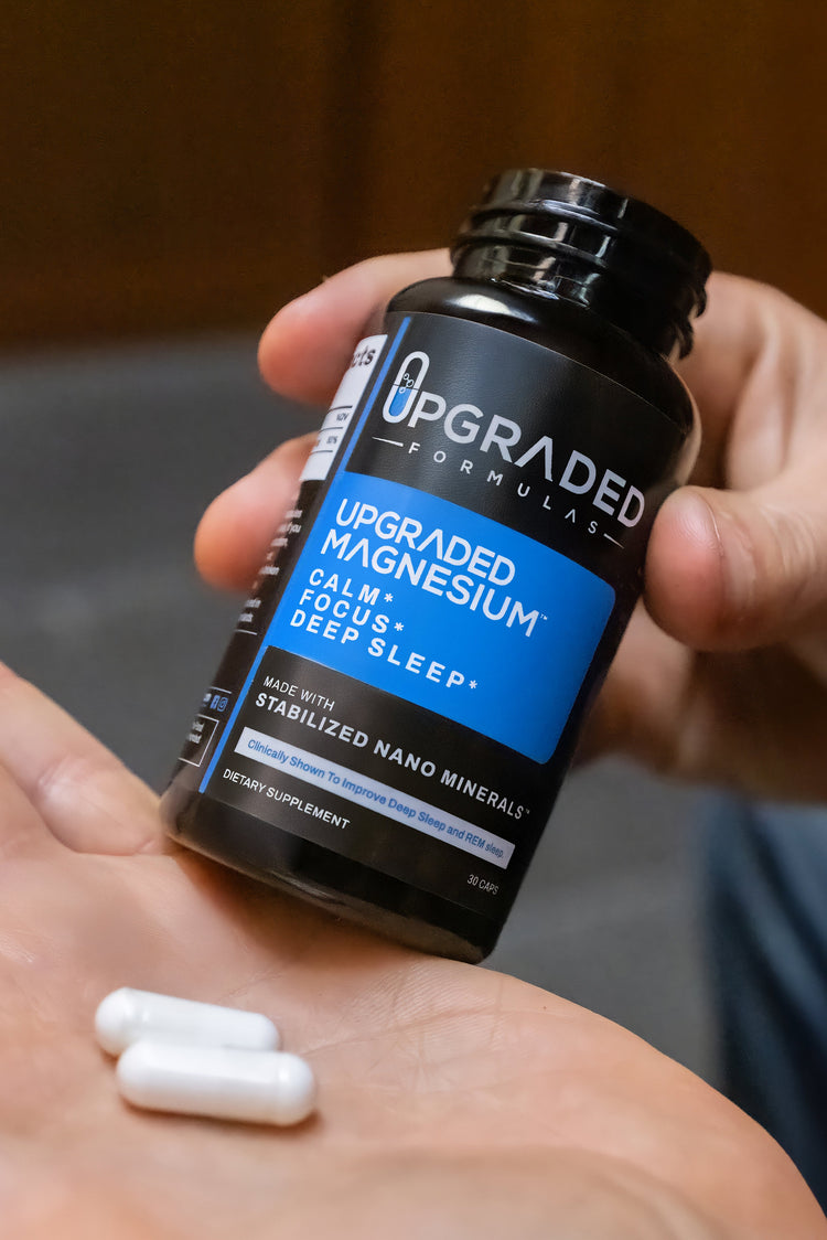 Upgraded Formulas magnesium supplement bottle with 60 capsules, promoting improved REM and deep sleep.