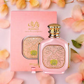 Zimaya Zukhuruf Pink Eau de Parfum for women by Farmacias Savia, 3.4 oz perfume bottle with pink accents and elegant design.